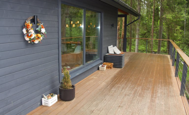 Professional deck staining on wood deck improving durability and outdoor curb appeal