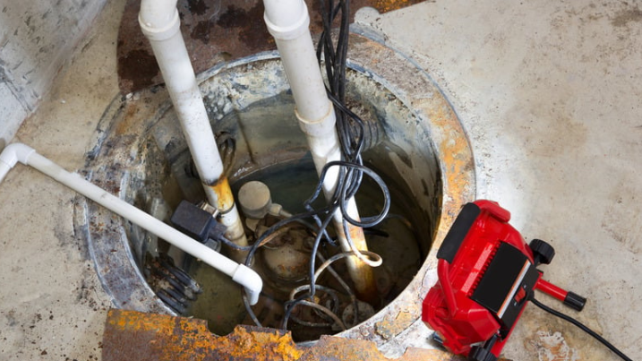 basement sump pump basin installed during professional sump pump installation service for flood prevention