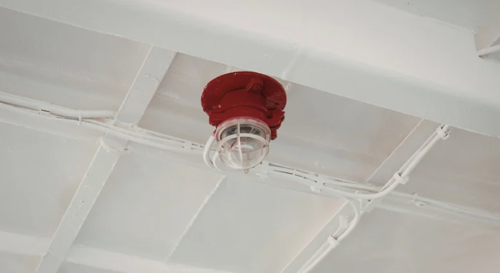 Residential fire sprinkler installation mounted on ceiling for home fire protection system